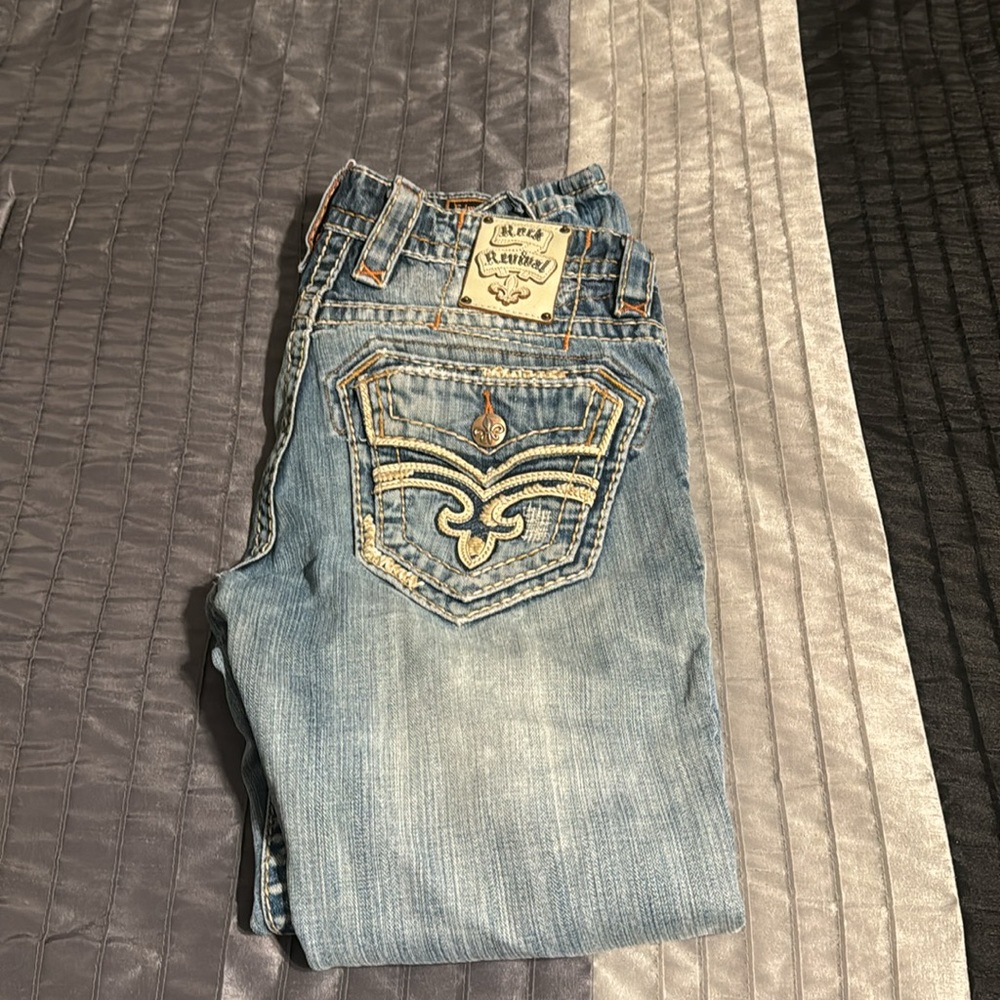 Selling 29 waist, buckle, jeans, rock revival jeans